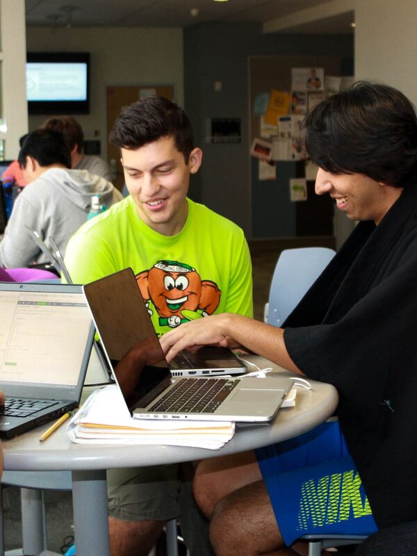 A team around one laptop at a Georgia Tech hackathon